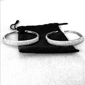 Silver tone bangle bracelets (set of 2)